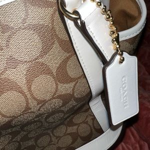 Baby Bag In Signature Canvas. COLOR:
Gold/KHAKI/CHALK.